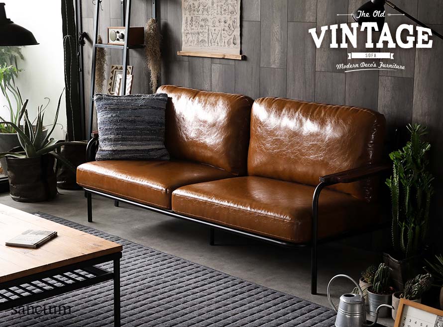 The Sanctum 3 seater japanese sofa with metal frame in a modern living room.